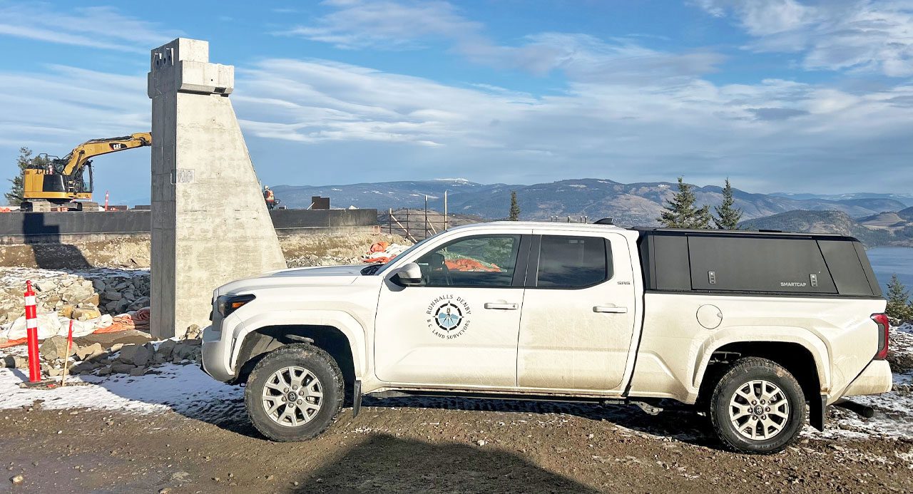 Professional construction surveying for large-scale development projects in the Okanagan, BC region by Runnalls Denby.
